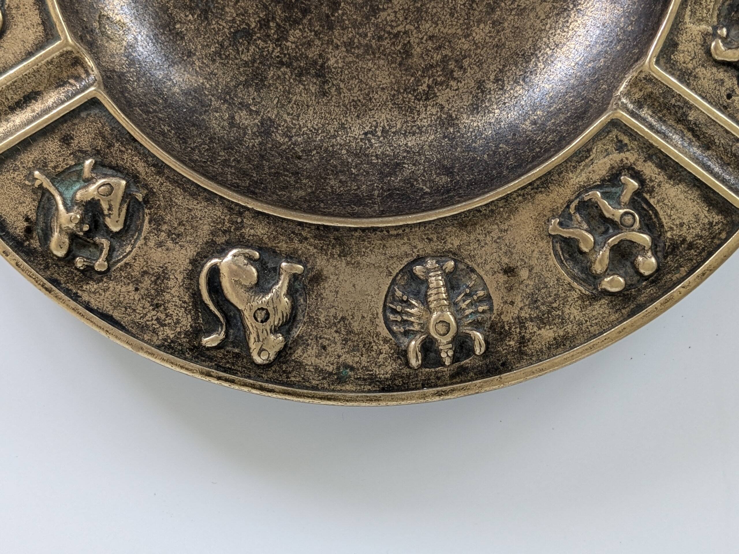 Large brass pocket emptier | Zodiac signs