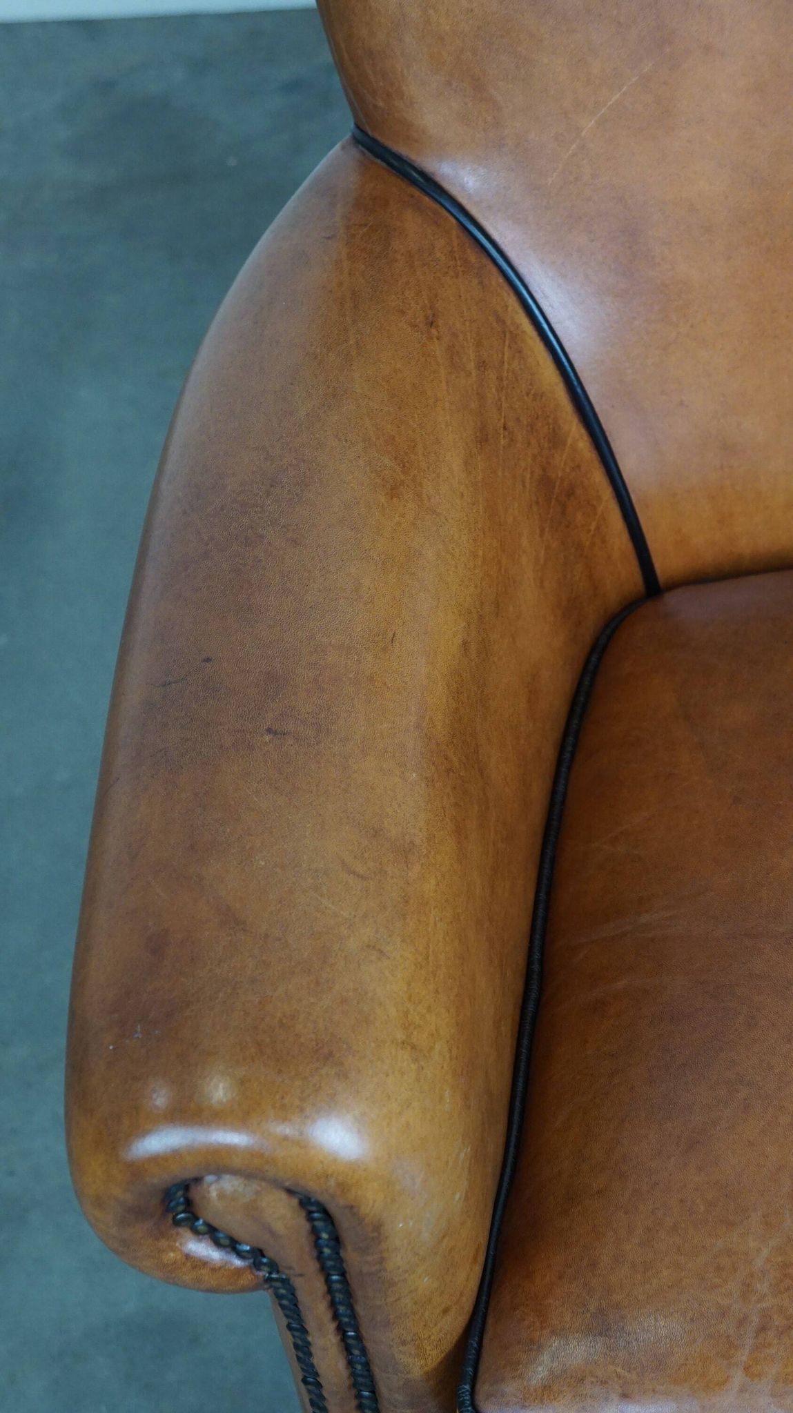 Fauteuil en cuir de mouton à l'aspect luxueux