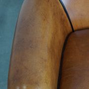 Fauteuil en cuir de mouton à l'aspect luxueux