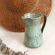 Glazed terracotta pitcher