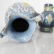 Two small blue ceramic vases