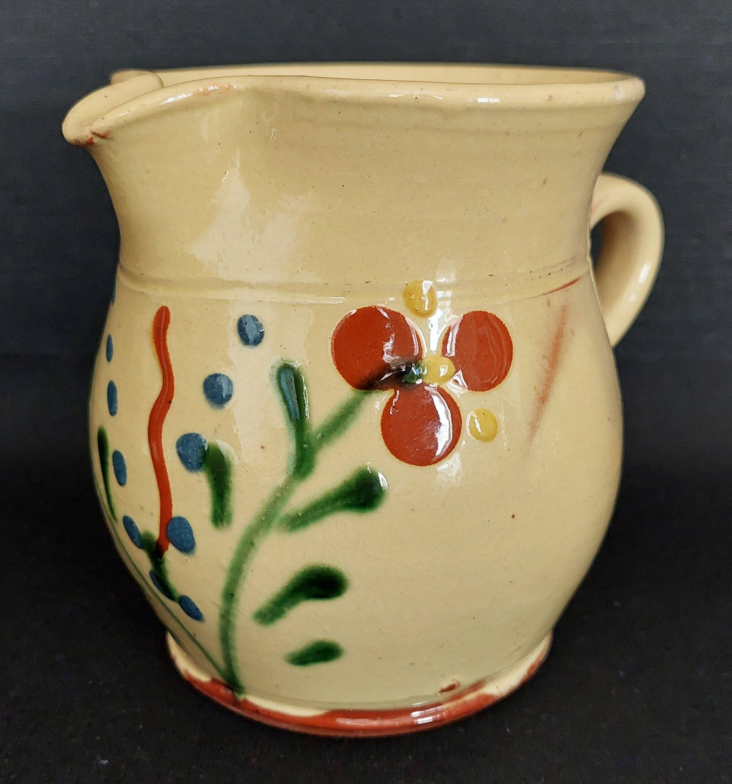 20th century Alsace glazed terracotta pitcher