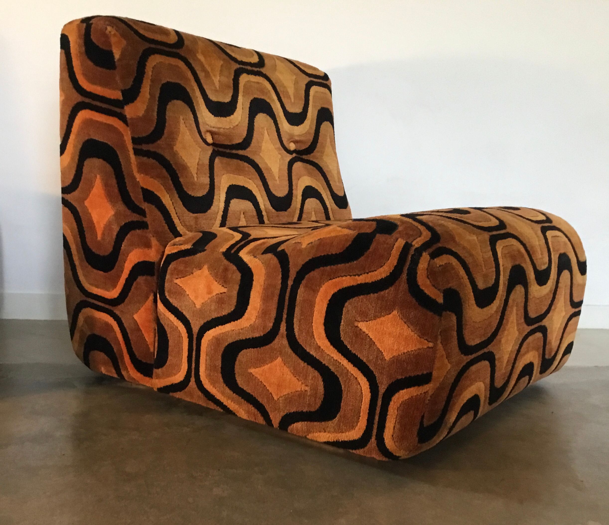 Vintage 1970s orange geometric patterned space-age armchair
