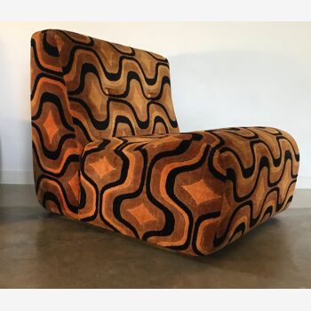 Space-age armchair with orange geometric patterns vintage 1970