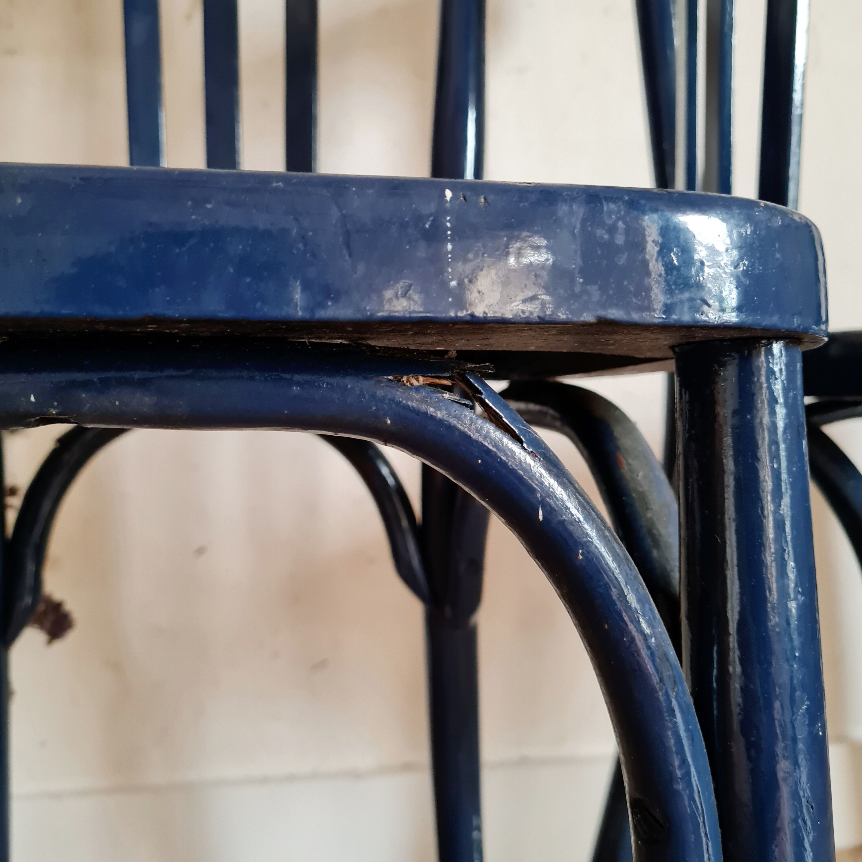 Duo of old blue bistro chairs