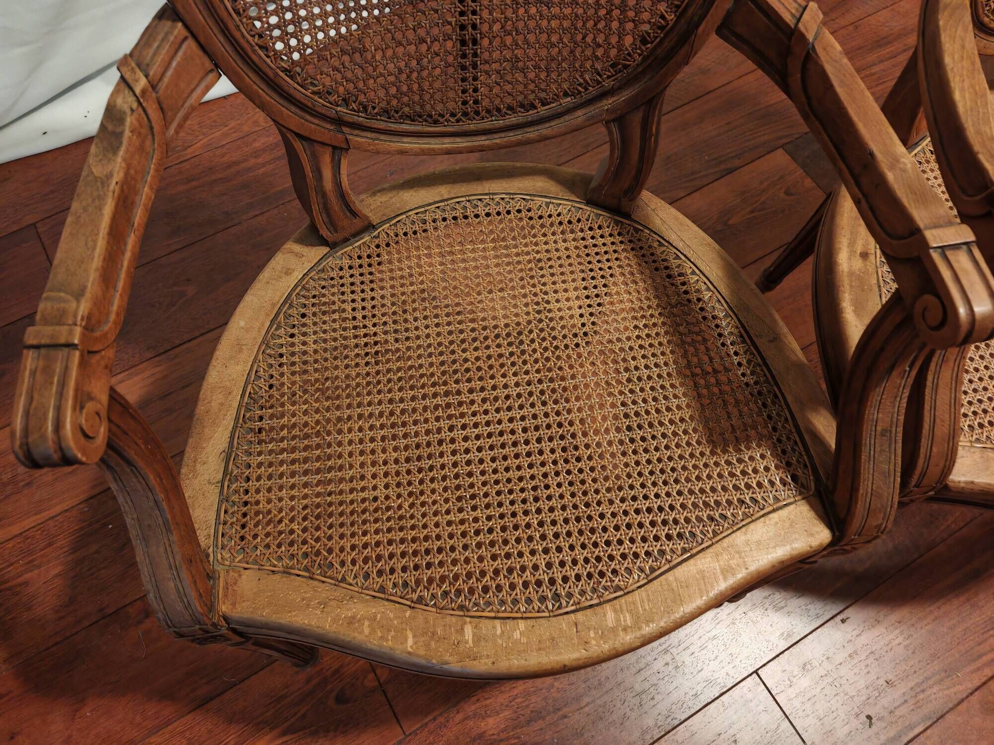 Caned armchairs