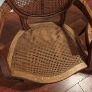 Caned armchairs
