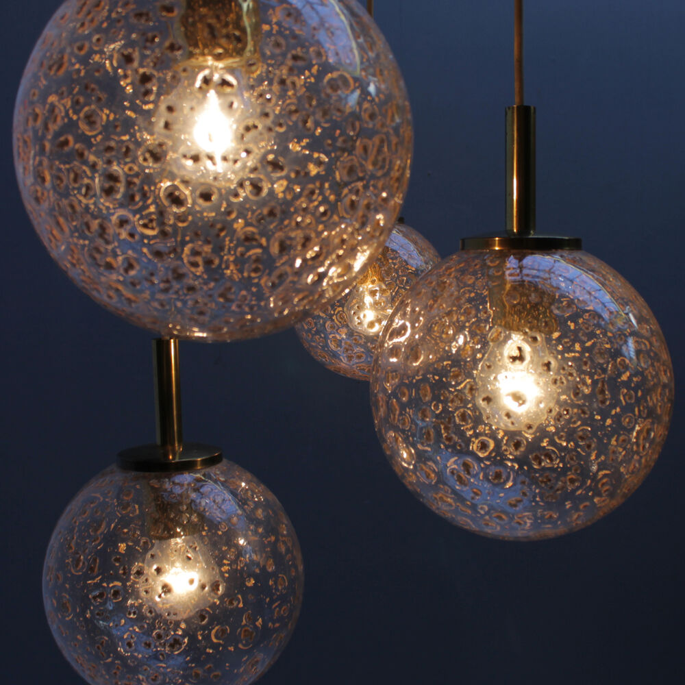Four gold fleck globe pendants by Doria Germany