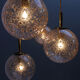 Four gold fleck globe pendants by Doria Germany