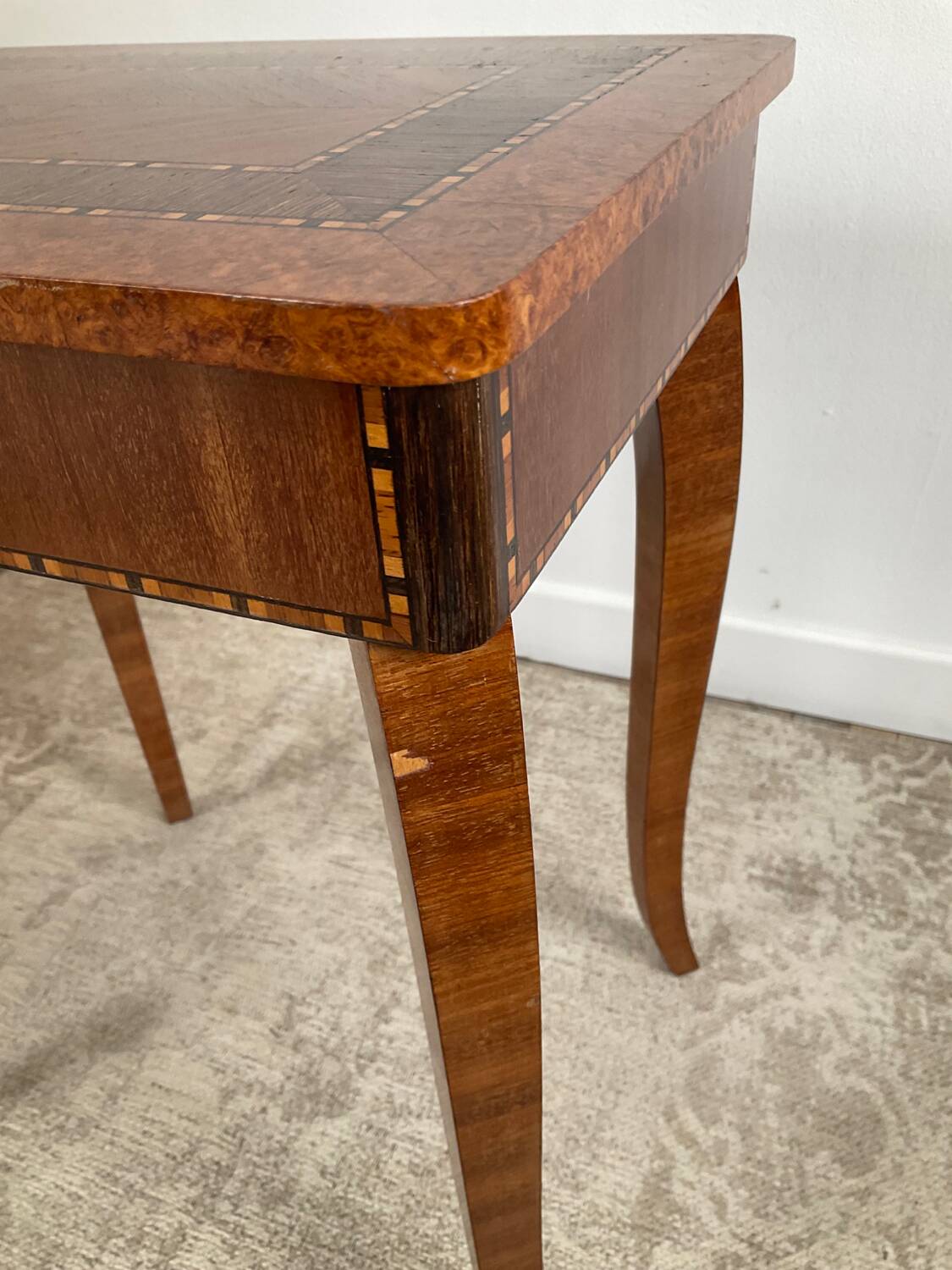 Small marquetry pedestal table with key storage