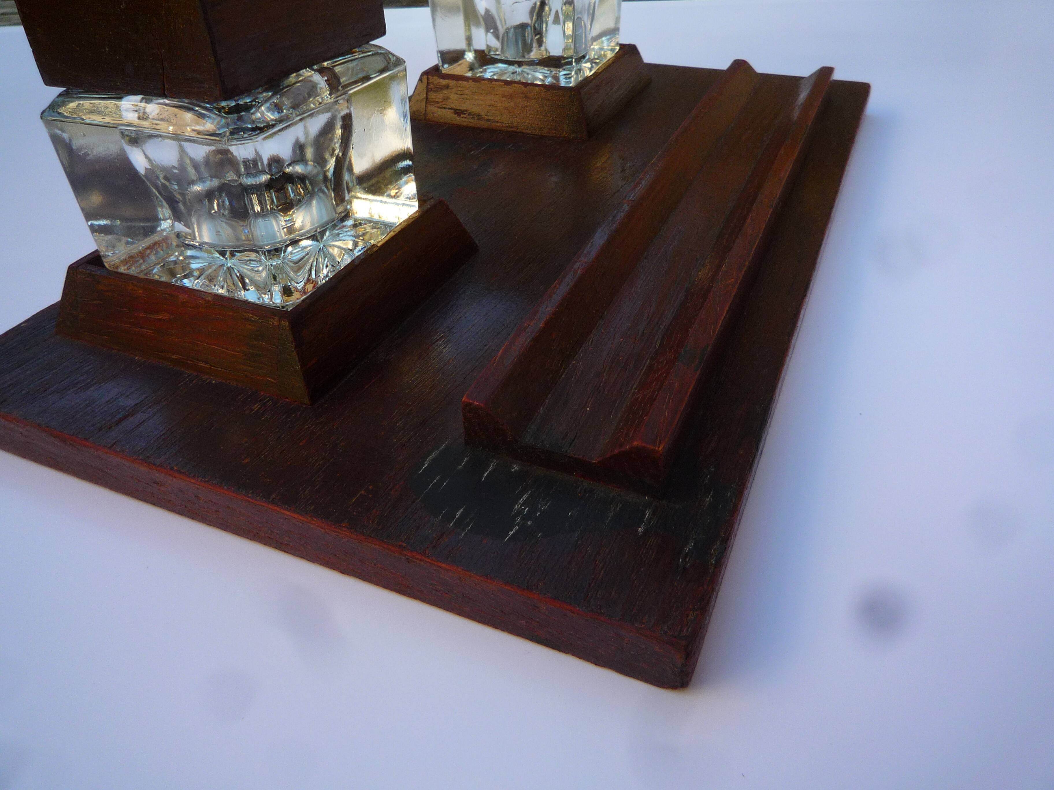 Wooden writing set including two glass inkwells, circa 1950