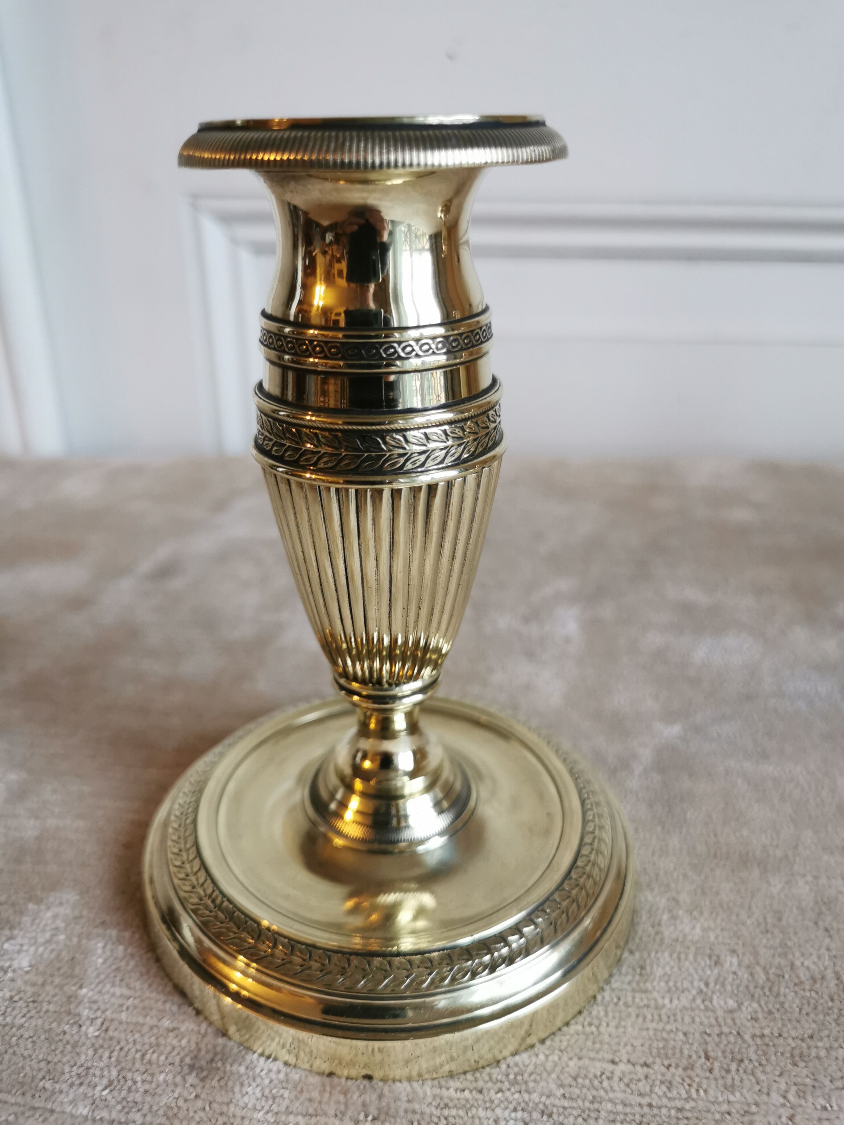 Pair of candlesticks in polished bronze Directoire d'époque
