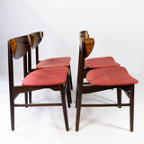 Set of four dining room chairs in rosewood and upholstered with red fabric, of danish design, 1960s