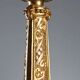 Antique gilded bronze candelabrum, 19th-century decorations.