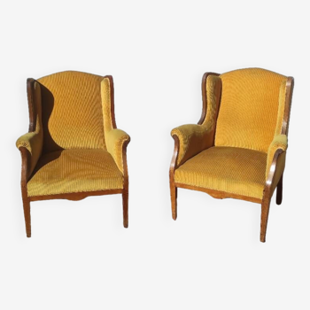 Paire de bergères à oreilles Louis Philippe fauteuils jaunes moutardes