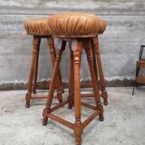 3 vintage oak and leather bar stools from the 1970s