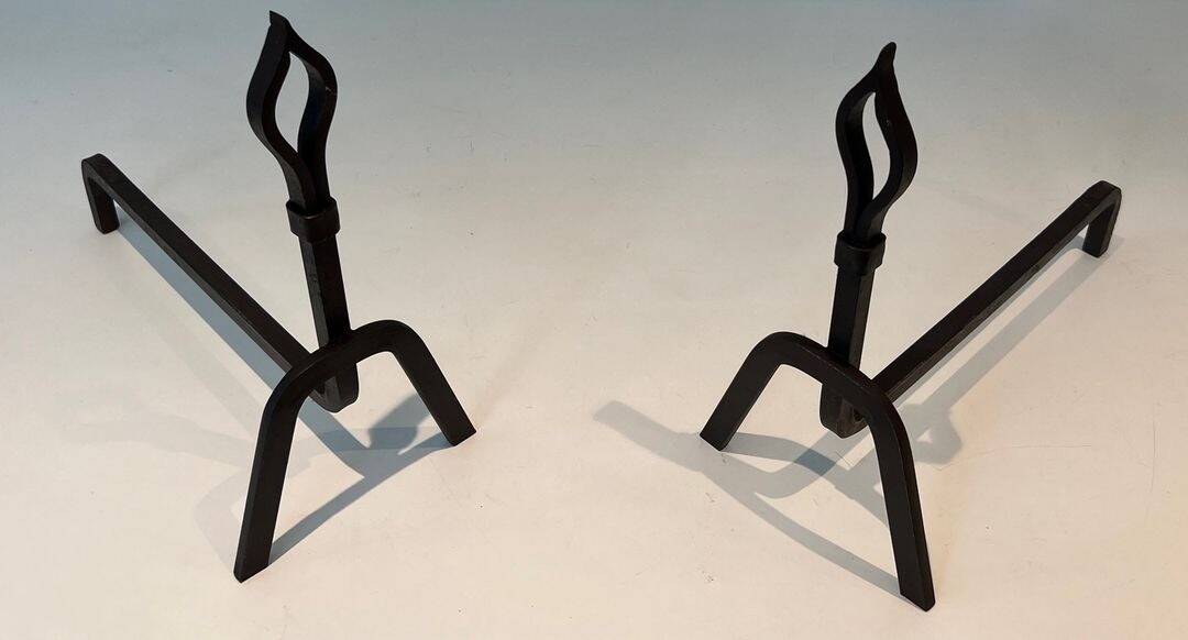 Pair of Modernist Andirons in Wrought Iron with Stylised Torches and Bases Ang