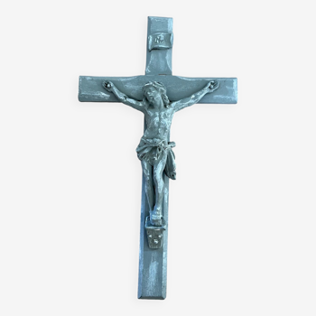 Old crucifix in gray patinated wood with aged effect