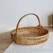 Vintage hand-woven wicker harvest basket