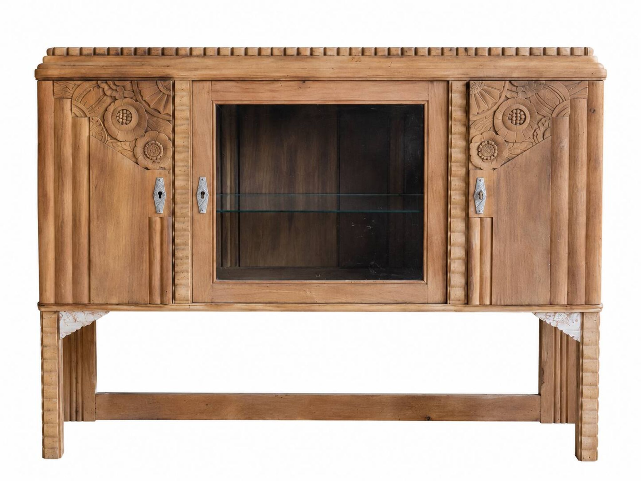 Art Deco glass-fronted sideboard in carved walnut and brass.