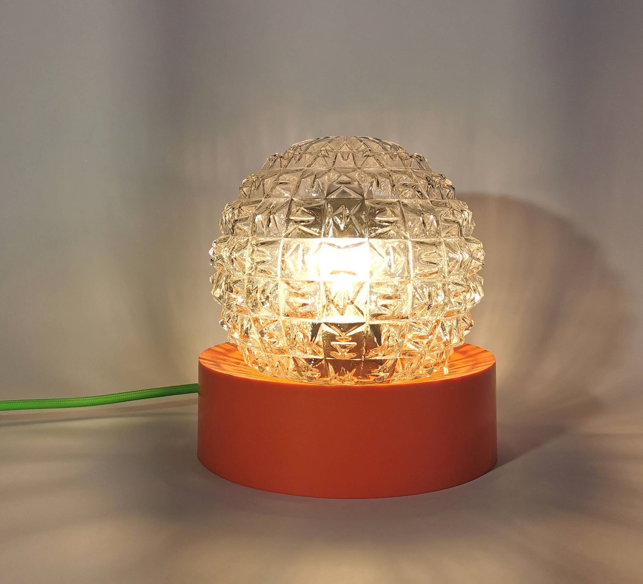 Lampe boule vintage en verre transparent orange