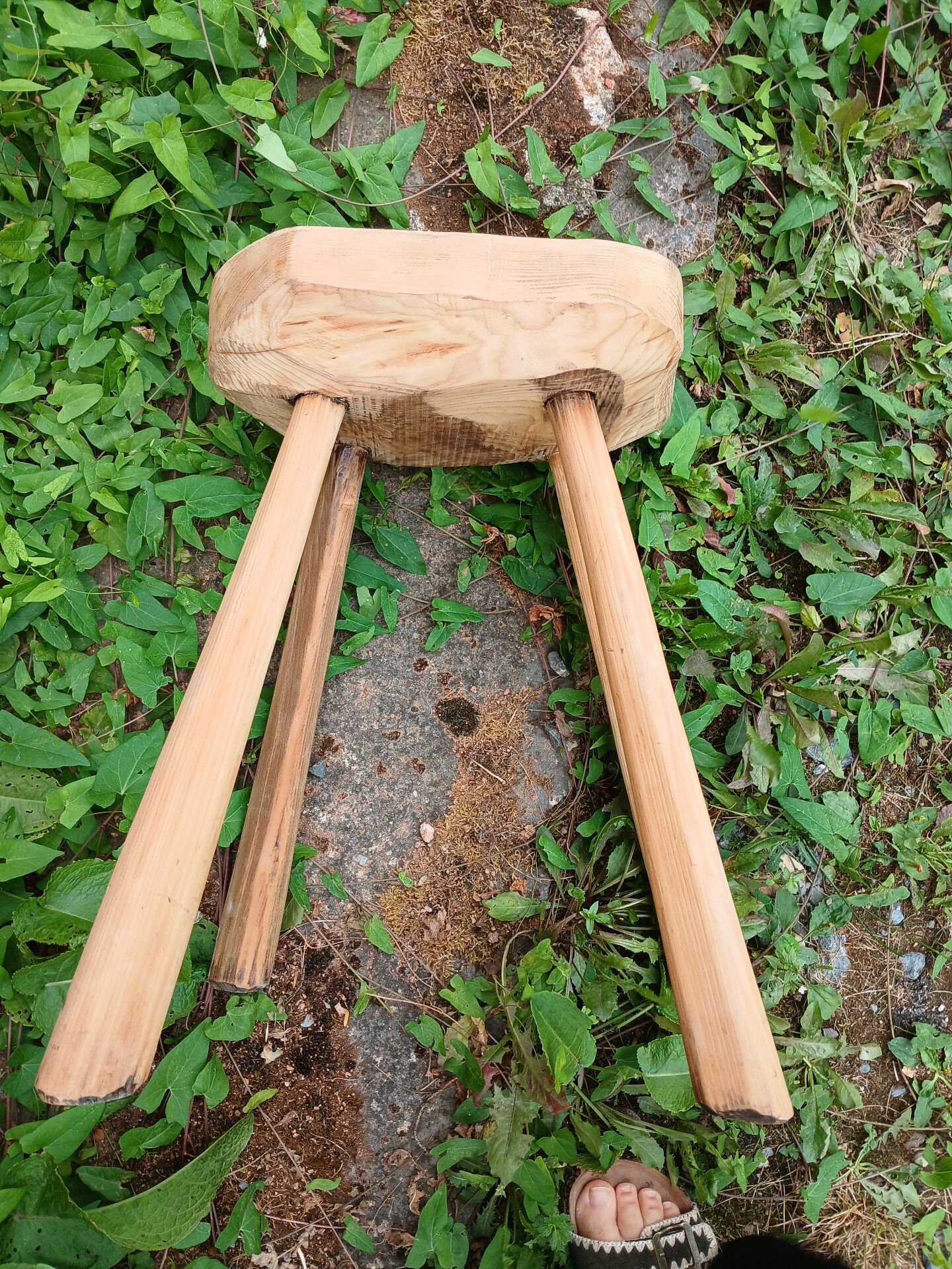 Antique stool in raw wood