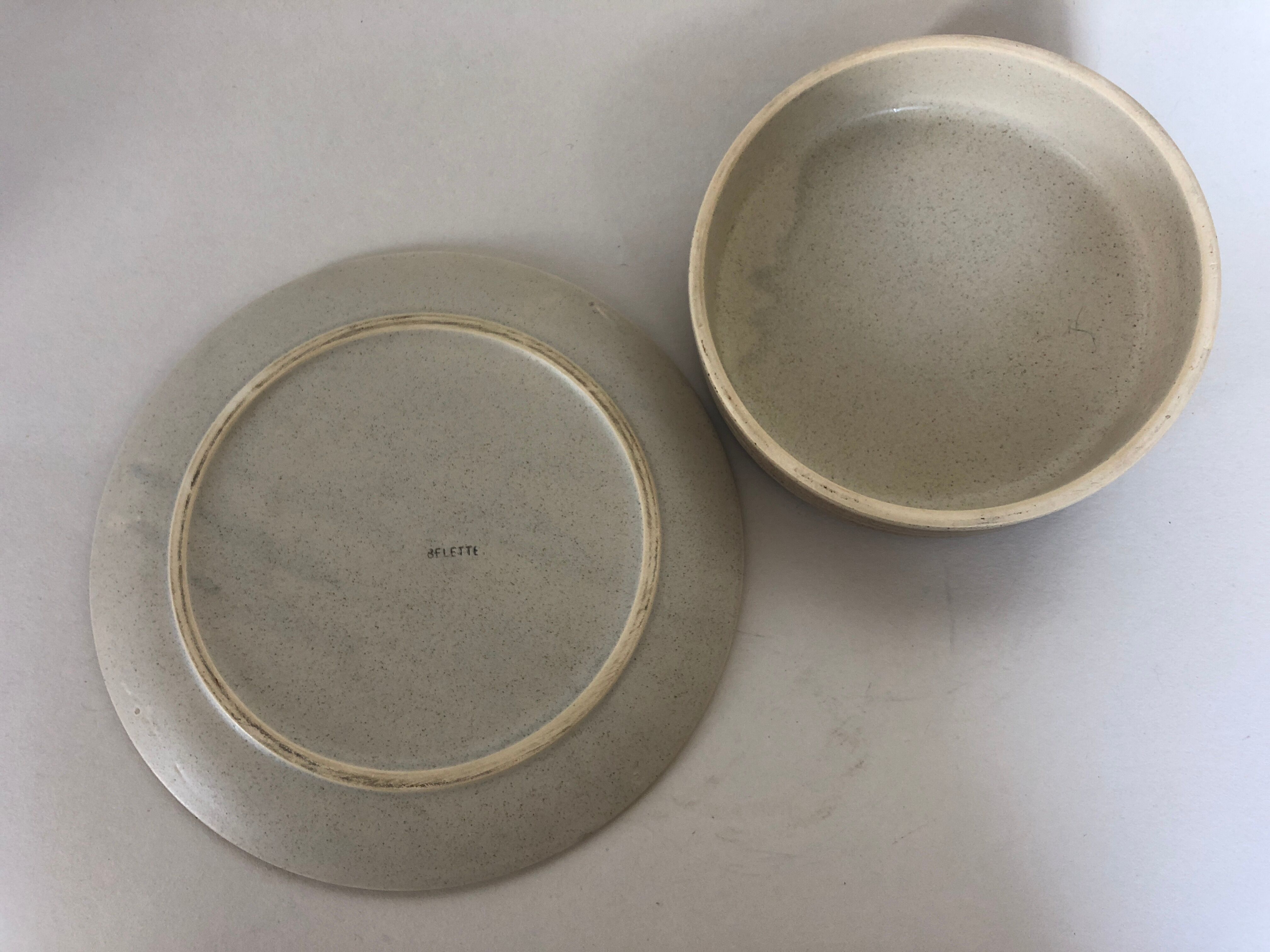 Dish with Bell in speckled sandstone