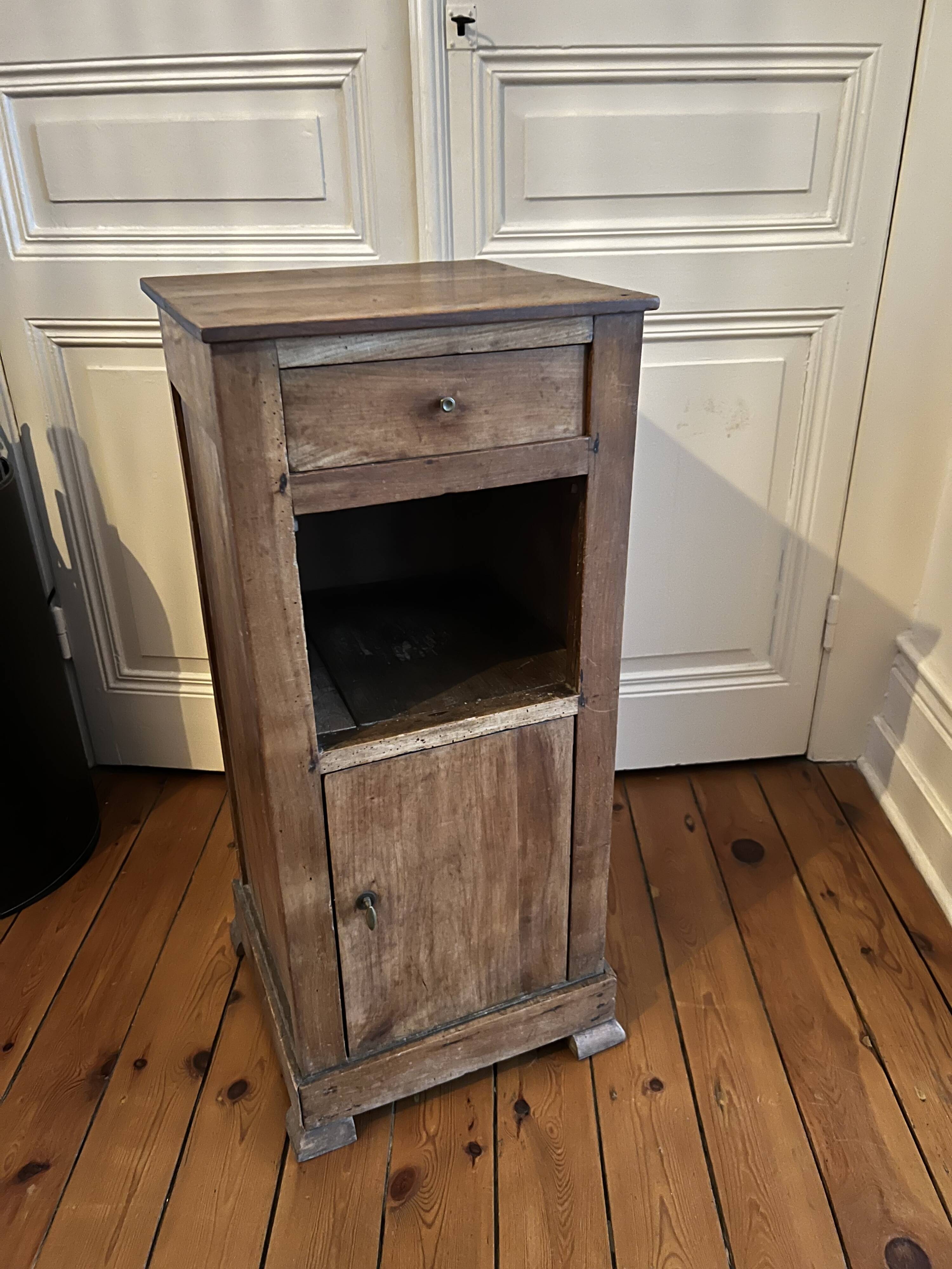 Old wooden bedside table