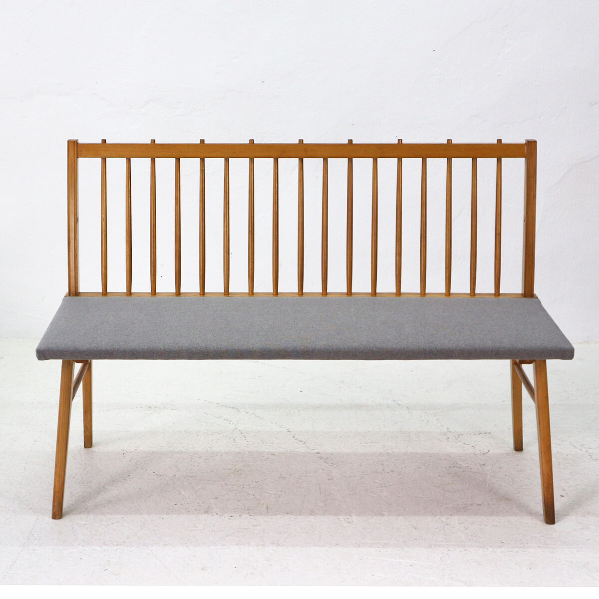Reupholstered beechwood bench, 1950