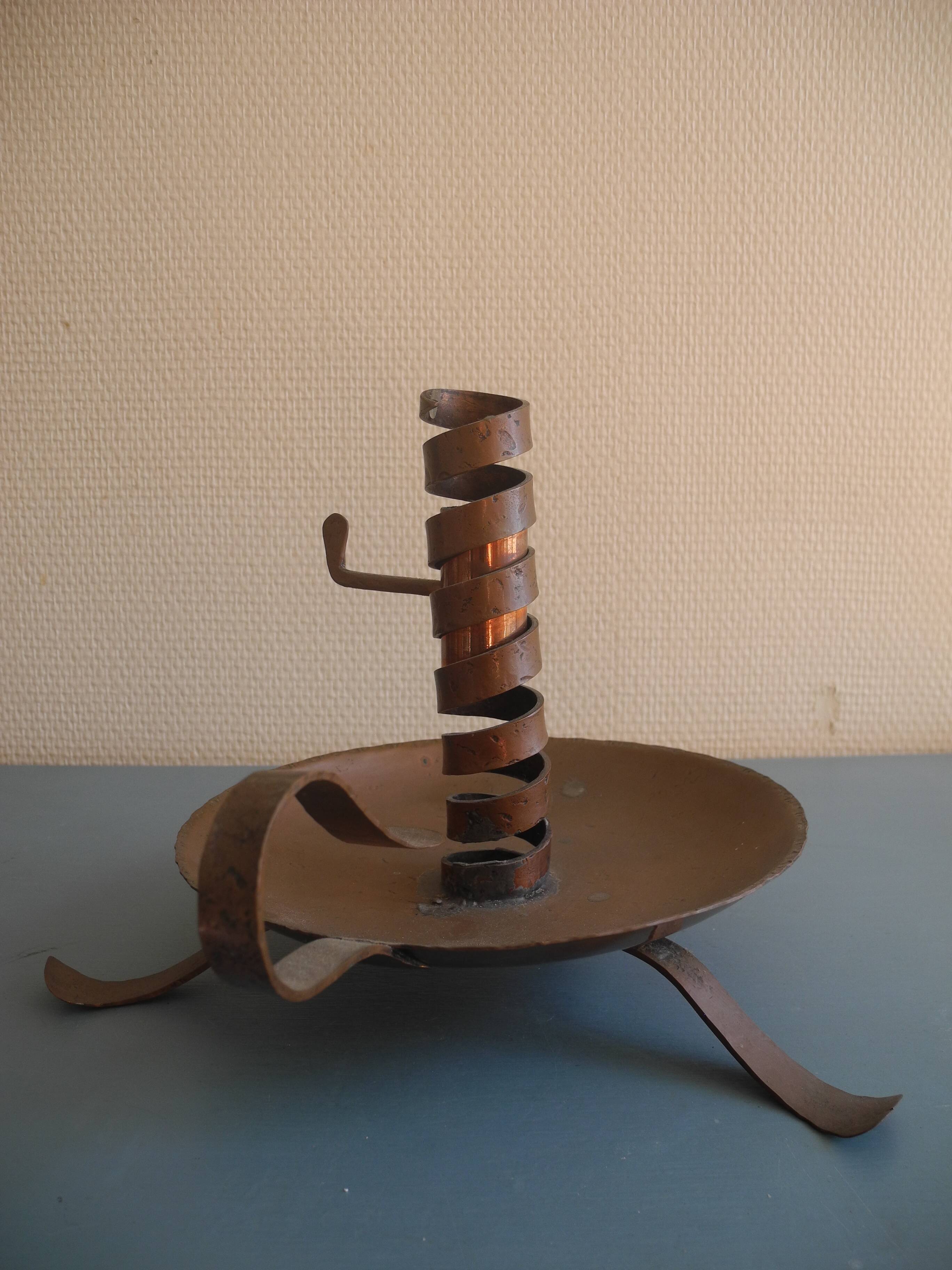 old pig tail rat cave copper candle holder