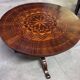 Round "Sorrentino" gueridon inlaid with a rosette design.