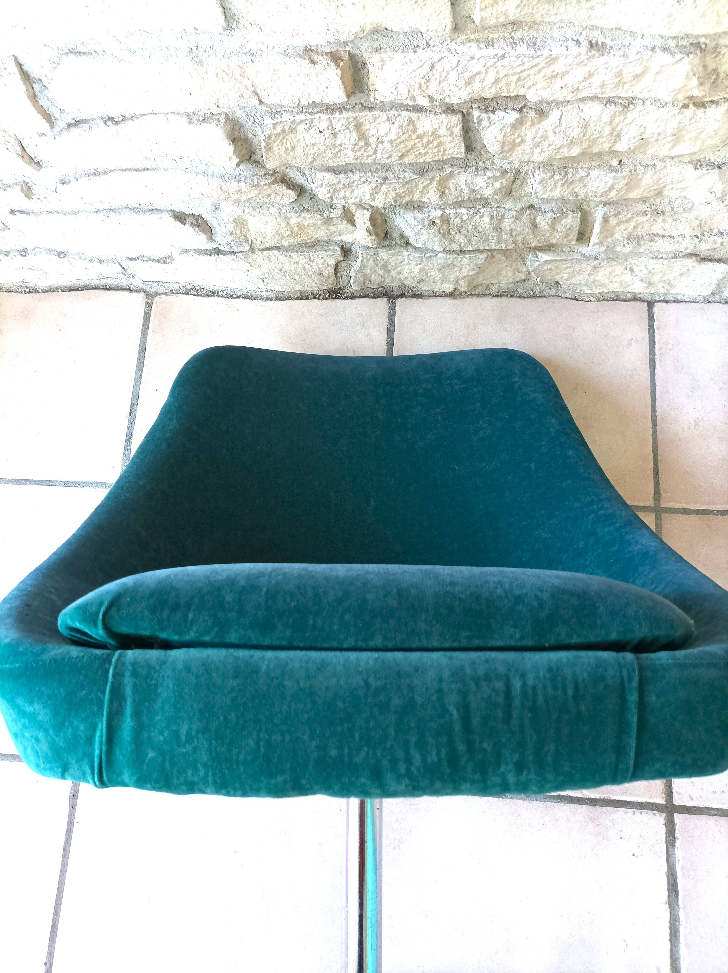 Green velvet armchair