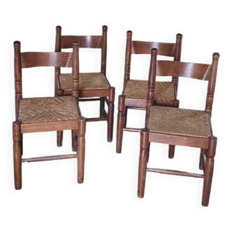 Set of 4 solid wood chairs with rush seating.