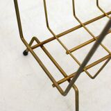 Mid-century openwork magazine rack, in gold metal & wooden handle.