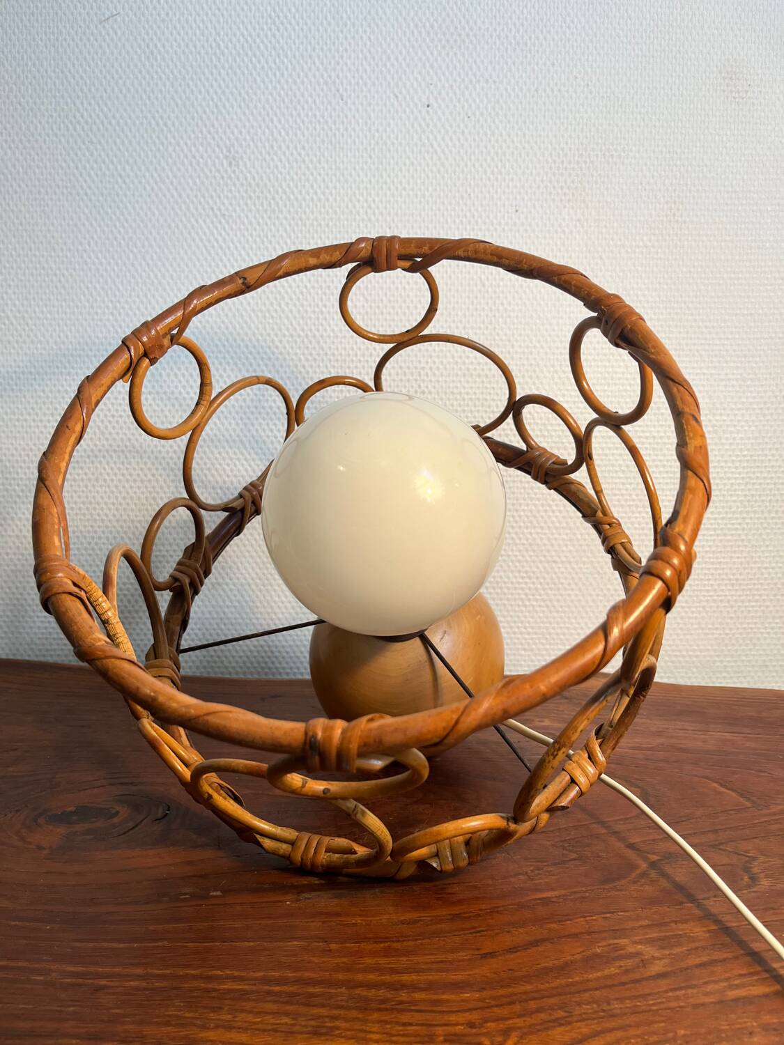 Solid wood table lamp with opaline wicker globe