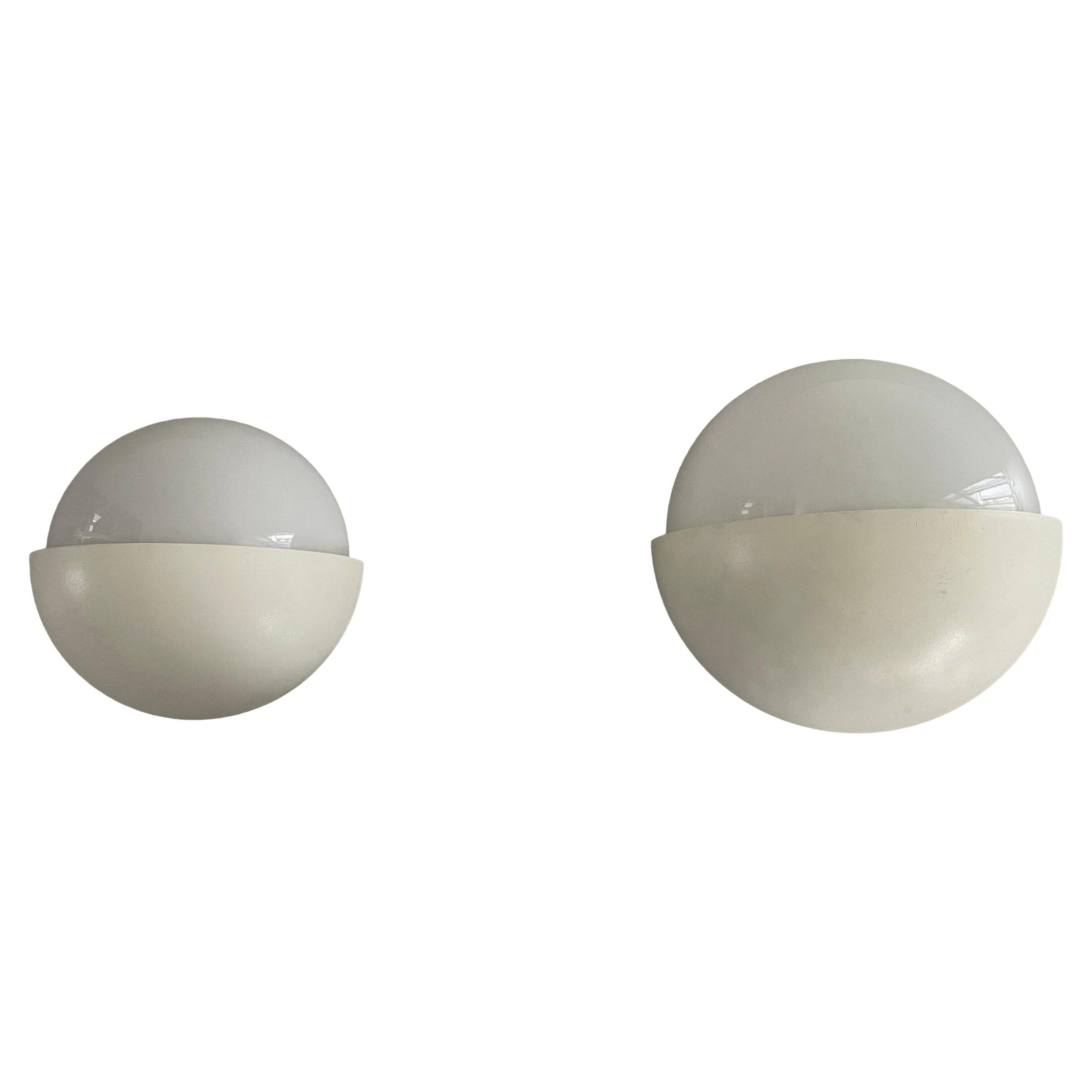 Round wall lights, small and large, in white metal by Bega, 1970s, Germany.