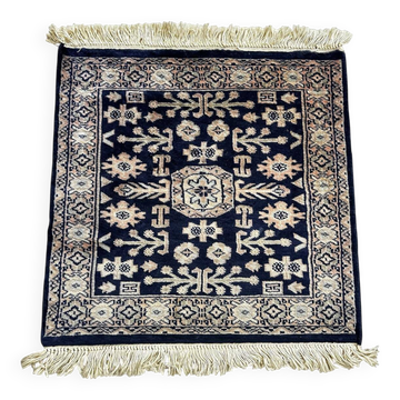 Handmade Persian rug, square 67cm x 62cm.