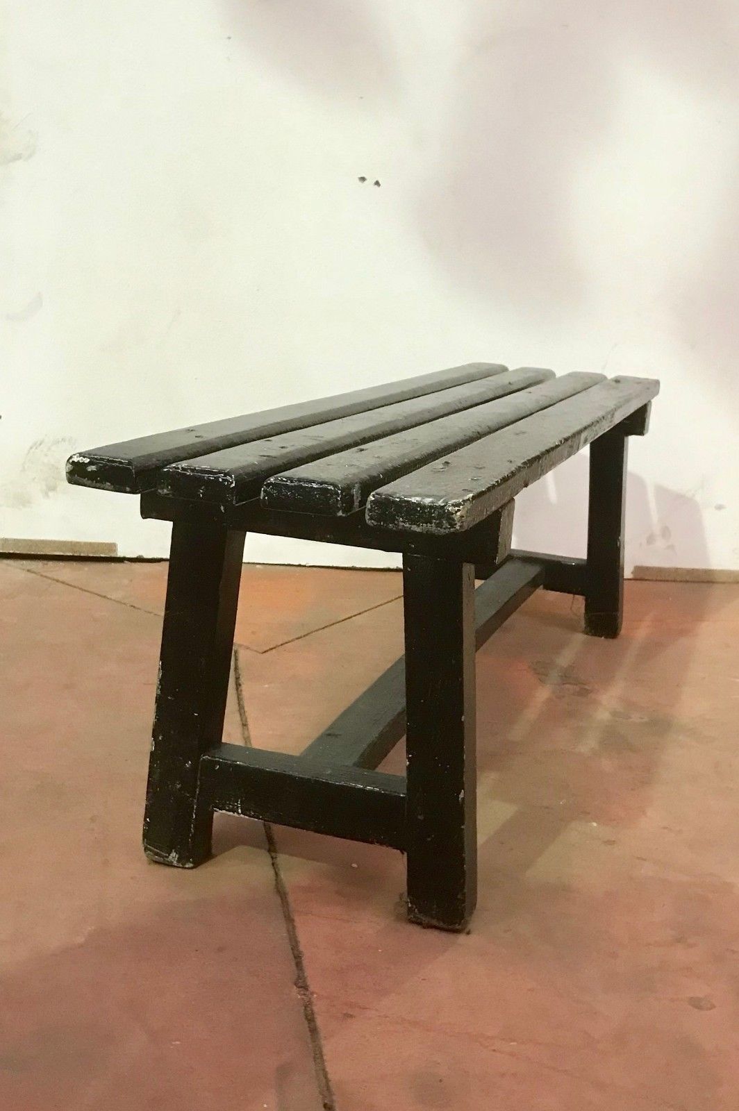 Patinated black minimalist bench