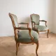 Pair of cabriolet armchairs in Louis XV style in green velvet.