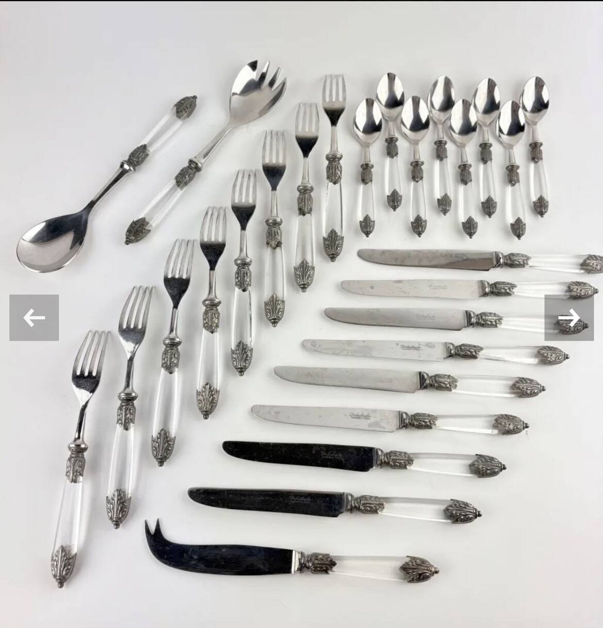 Silver-plated metal cutlery set, plexiglass and stainless steel.