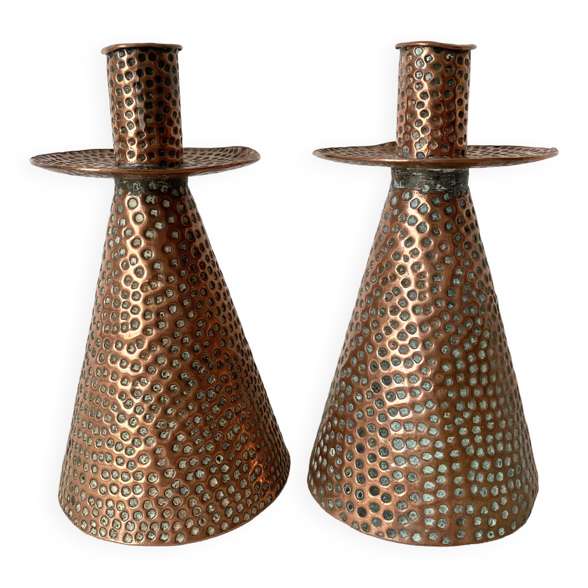 Pair of hammered copper candlesticks from the 1950s