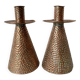 Pair of hammered copper candlesticks from the 1950s