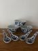 Set of 3 bowls and 4 blue Chinese spoons.