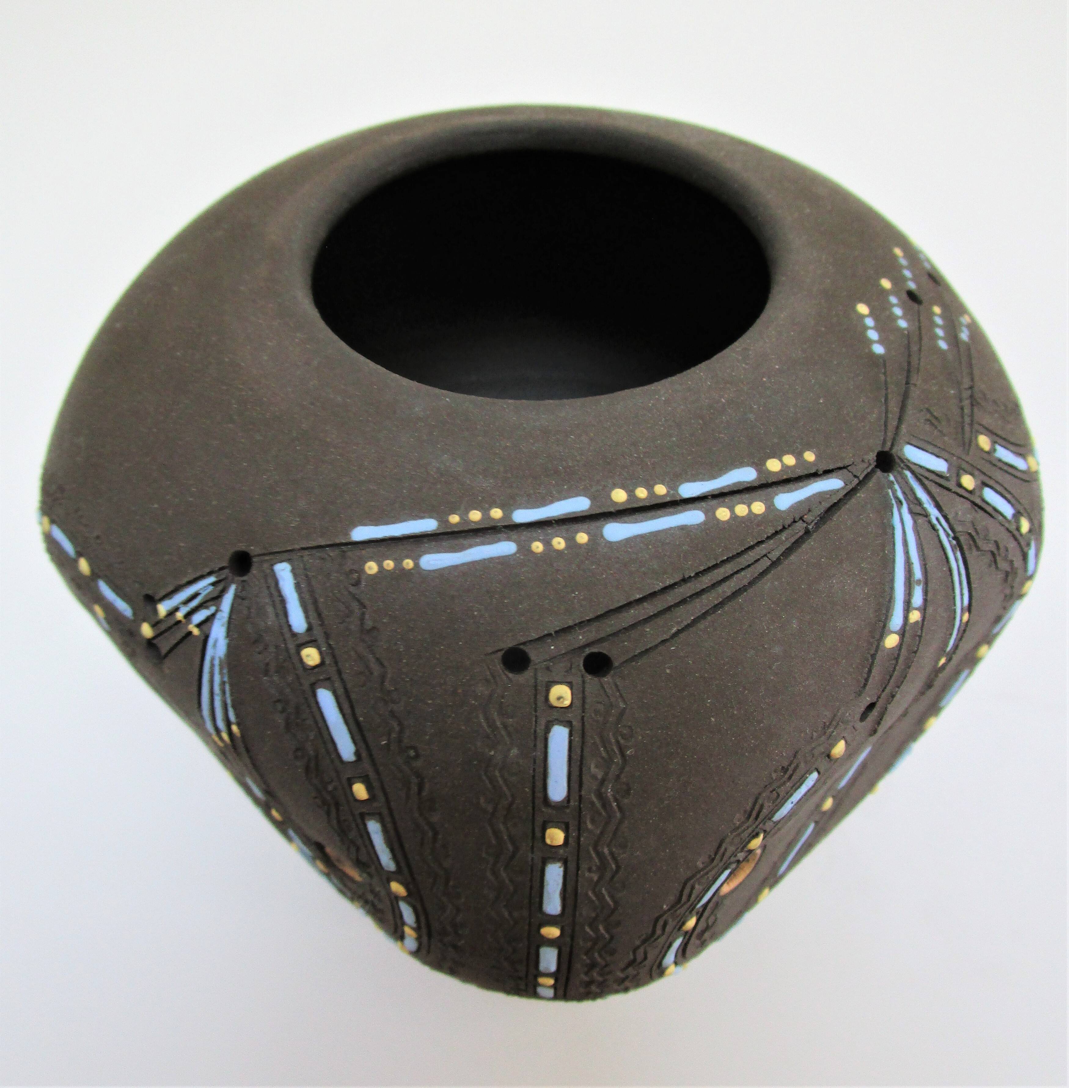 Anthropomorphic candle holder, scarified ceramic, stamped design