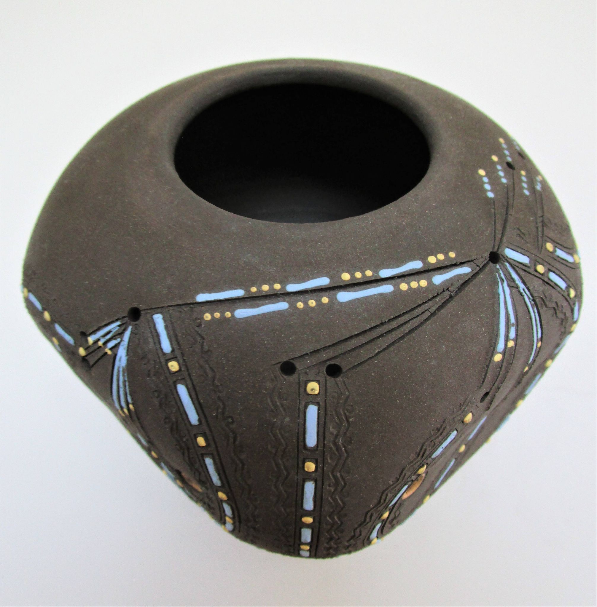 Anthropomorphic candle holder, scarified ceramic, stamped design
