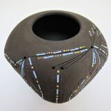 Anthropomorphic candle holder, scarified ceramic, stamped design