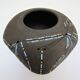 Anthropomorphic candle holder, scarified ceramic, stamped design