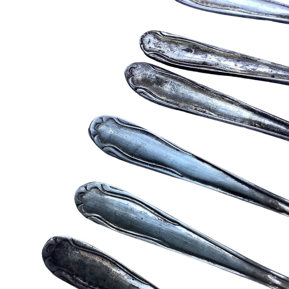 Nine small silver teaspoons