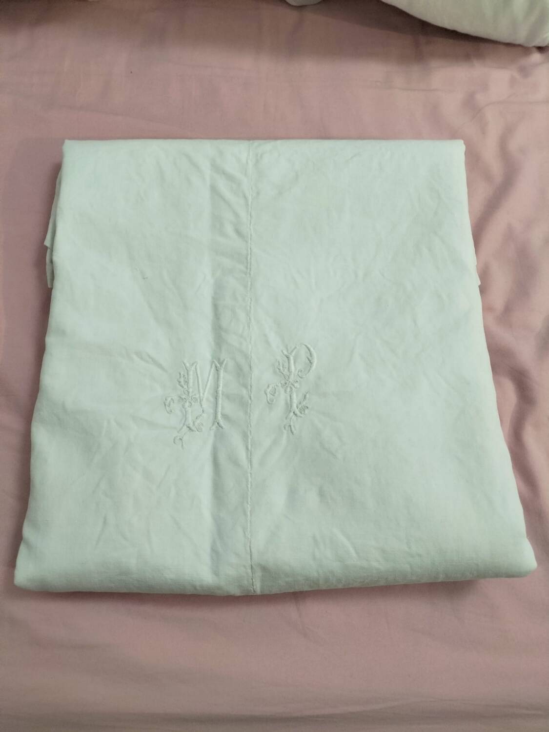 Old fabric, embroidered with the monogram MP.
