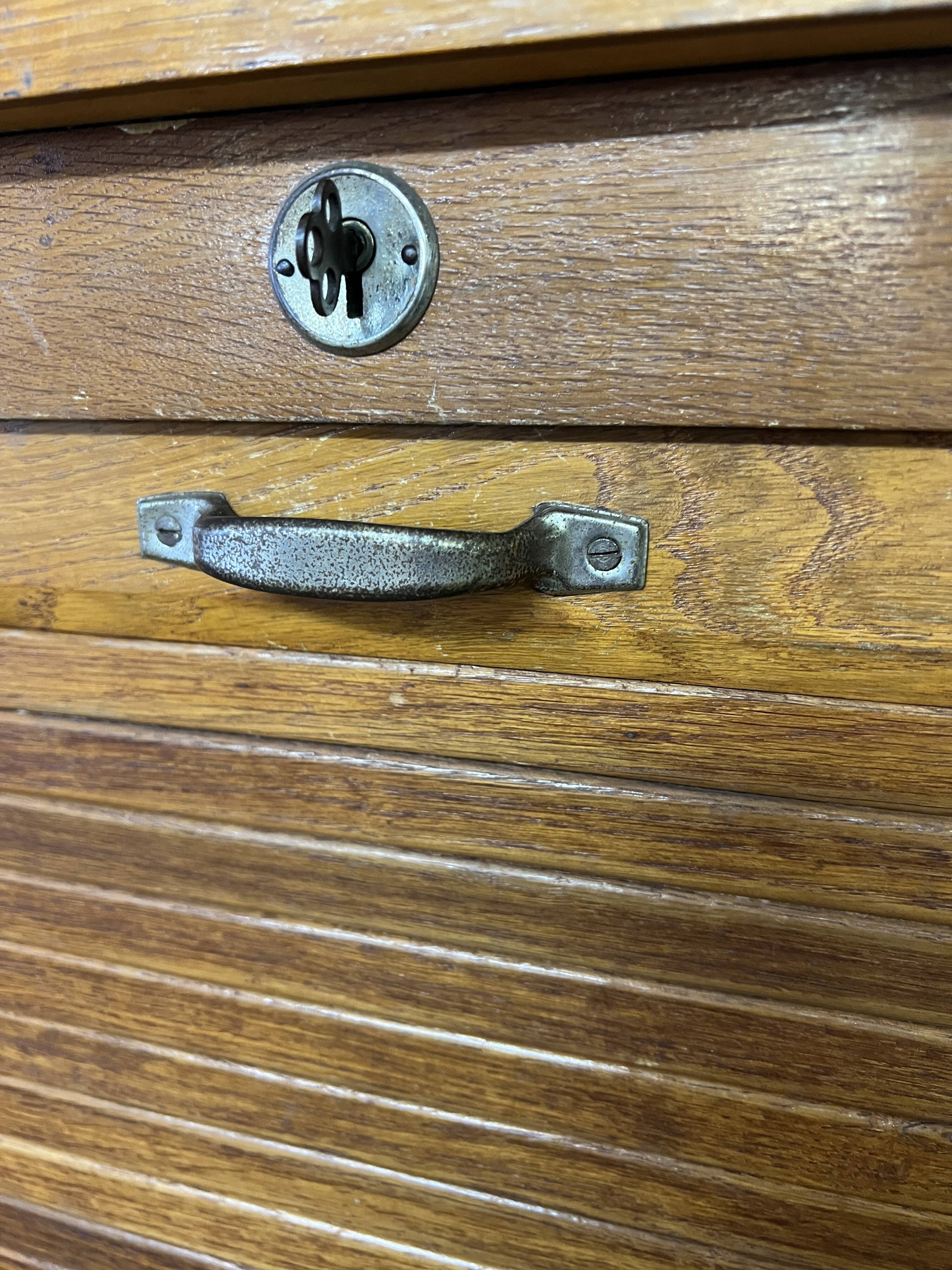 Old filing cabinet with triple curtains